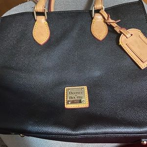 Donned& Burke Good Condition just a little spot inside the bag on the bottom.